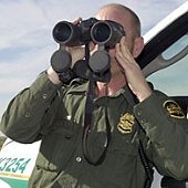 Border Patrol Agent with Binoculars